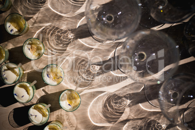 Empty glasses on table in night club or restaurant, closeup