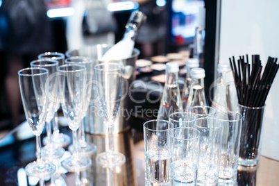 Empty glasses on table in night club or restaurant, closeup