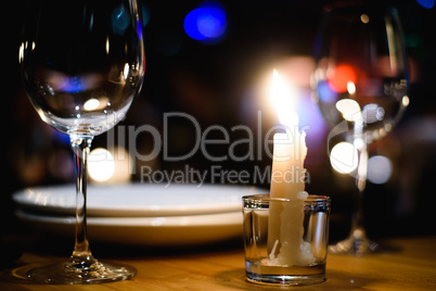Empty glasses on table in night club or restaurant, closeup