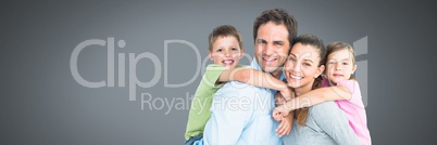 Family close together with grey background