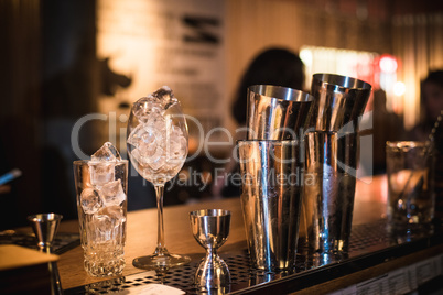 Empty glasses on table in night club or restaurant, closeup