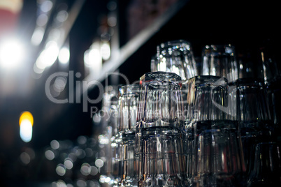 Empty glasses on table in night club or restaurant, closeup