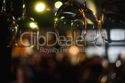 Empty glasses on table in night club or restaurant, closeup