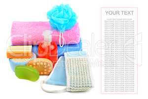 Cotton towels, cosmetic soap and shampoo isolated on white backg