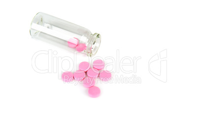 Medical preparations, pills in a glass bottle isolated on white