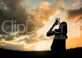 woman silhouette with ok sign