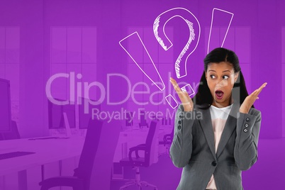 Confused or surprised woman looking left in an office with exclamation and question marks