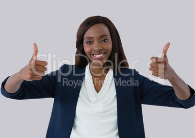businesswoman smiling with thumbs up