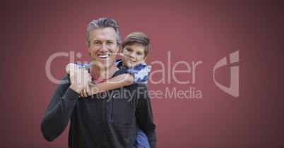 Father and son with red background