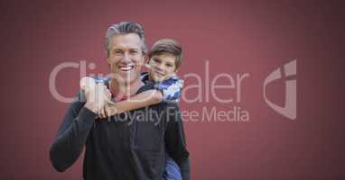 Father and son with red background