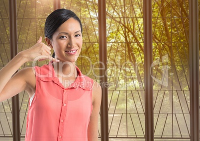 woman smiling with ring me sign