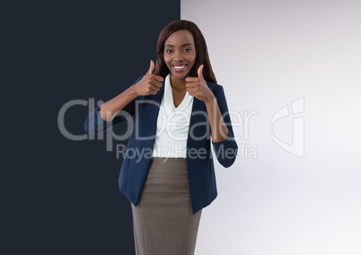 woman smiling with thumbs up