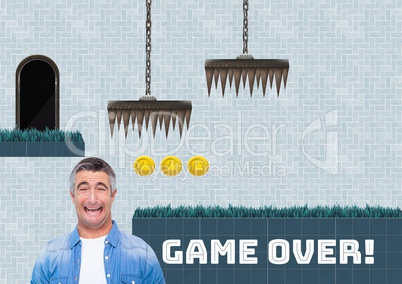 Game over text and disappointed man in Computer Game Level with coins and traps