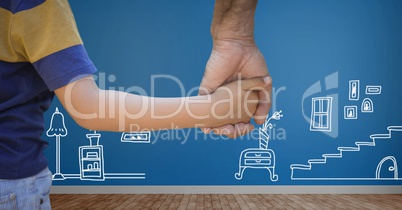 Child holding adults hand with home drawings