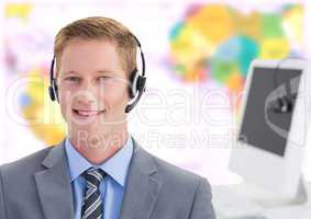 Travel agent man wearing headset in front of world map