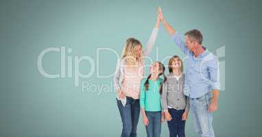 Family having fun together with green background