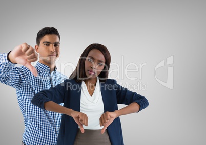man and woman with thumbs down