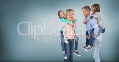 Family giving piggybacks with blue background