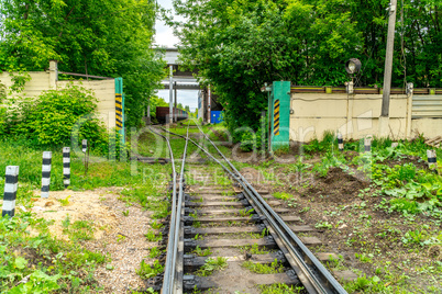 Railway track leading to the loading and unloading industrial building