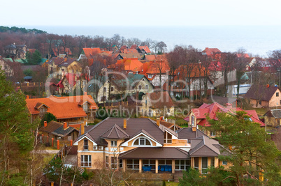 the village on the Bay, views of the village from above, multi-colored roofs