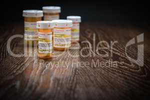 Variety of Non-Proprietary Prescription Medicine Bottles on Refl