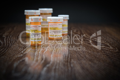 Variety of Non-Proprietary Prescription Medicine Bottles on Refl
