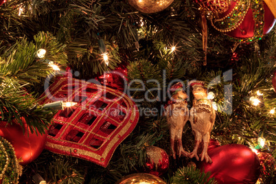 Christmas ornaments and white lights on a Christmas tree