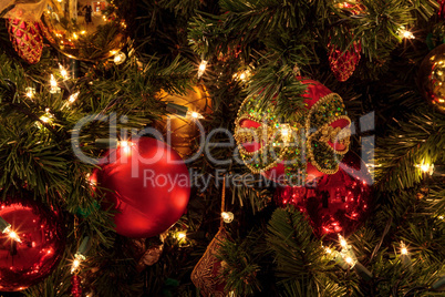 Christmas ornaments and white lights on a Christmas tree