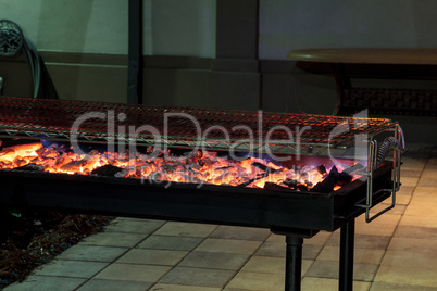 Fire hot coals on a grill ready to cook barbecue