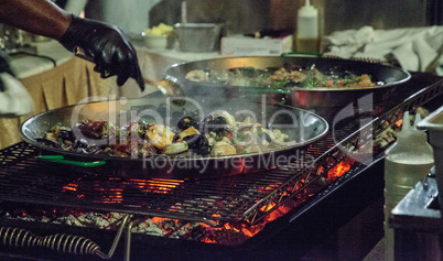 Seafood paella with shrimp, scallops, lobster and muscles