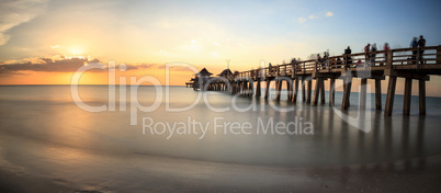 Naples Pier on the beach at sunset