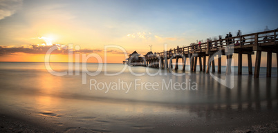 Naples Pier on the beach at sunset