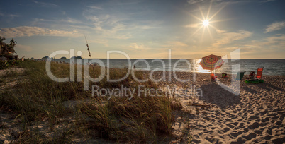 Umbrellas along Vanderbilt Beach in Naples, Florida