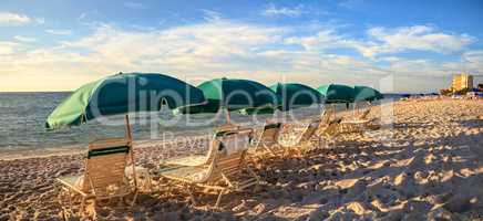 Umbrellas along Vanderbilt Beach in Naples, Florida