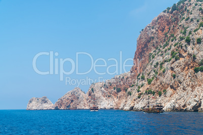 Cruise boats with tourists on Board, sailing along the magnificent scenic route along the Mediterranean coast