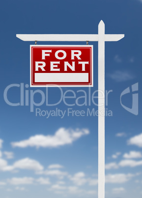 Left Facing For Rent Real Estate Sign on a Blue Sky with Clouds.