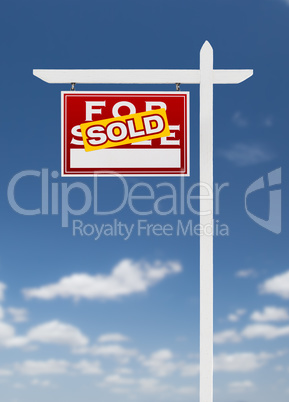 Left Facing Sold For Sale Real Estate Sign on a Blue Sky with Cl