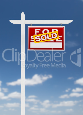 Right Facing Sold For Sale Real Estate Sign on a Blue Sky with C