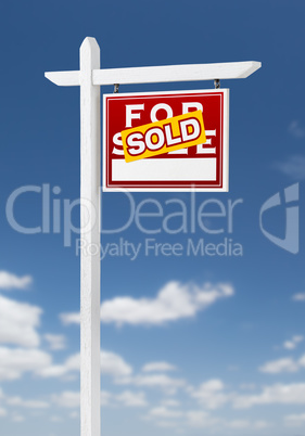 Right Facing Sold For Sale Real Estate Sign on a Blue Sky with C