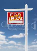 Left Facing Sold For Sale Real Estate Sign on a Blue Sky with Cl