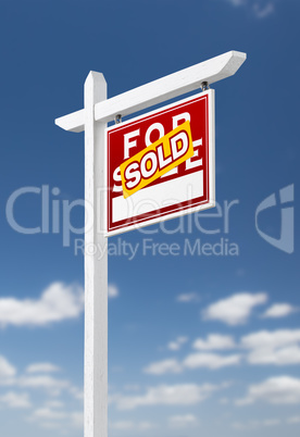 Right Facing Sold For Sale Real Estate Sign on a Blue Sky with C