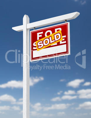 Right Facing Sold For Sale Real Estate Sign on a Blue Sky with C