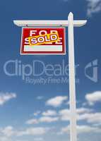 Left Facing Sold For Sale Real Estate Sign on a Blue Sky with Cl