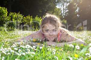 girl lying on a meadow