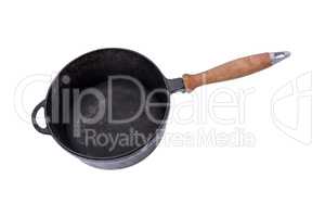 deep old black cast iron frying pan with wooden handle