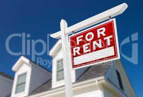 Right Facing For Rent Real Estate Sign In Front of House and Dee