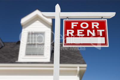 Right Facing For Rent Real Estate Sign In Front of House and Dee