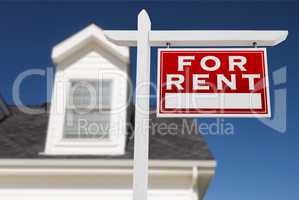 Right Facing For Rent Real Estate Sign In Front of House and Dee