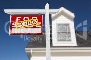 Left Facing Sold For Sale Real Estate Sign In Front of House and