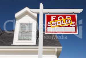 Right Facing Sold For Sale Real Estate Sign In Front of House an